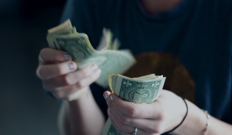 A Person Counting Cash 1