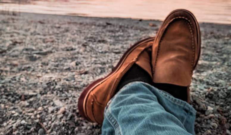 A Person Learning Digital Marketing At A Beach